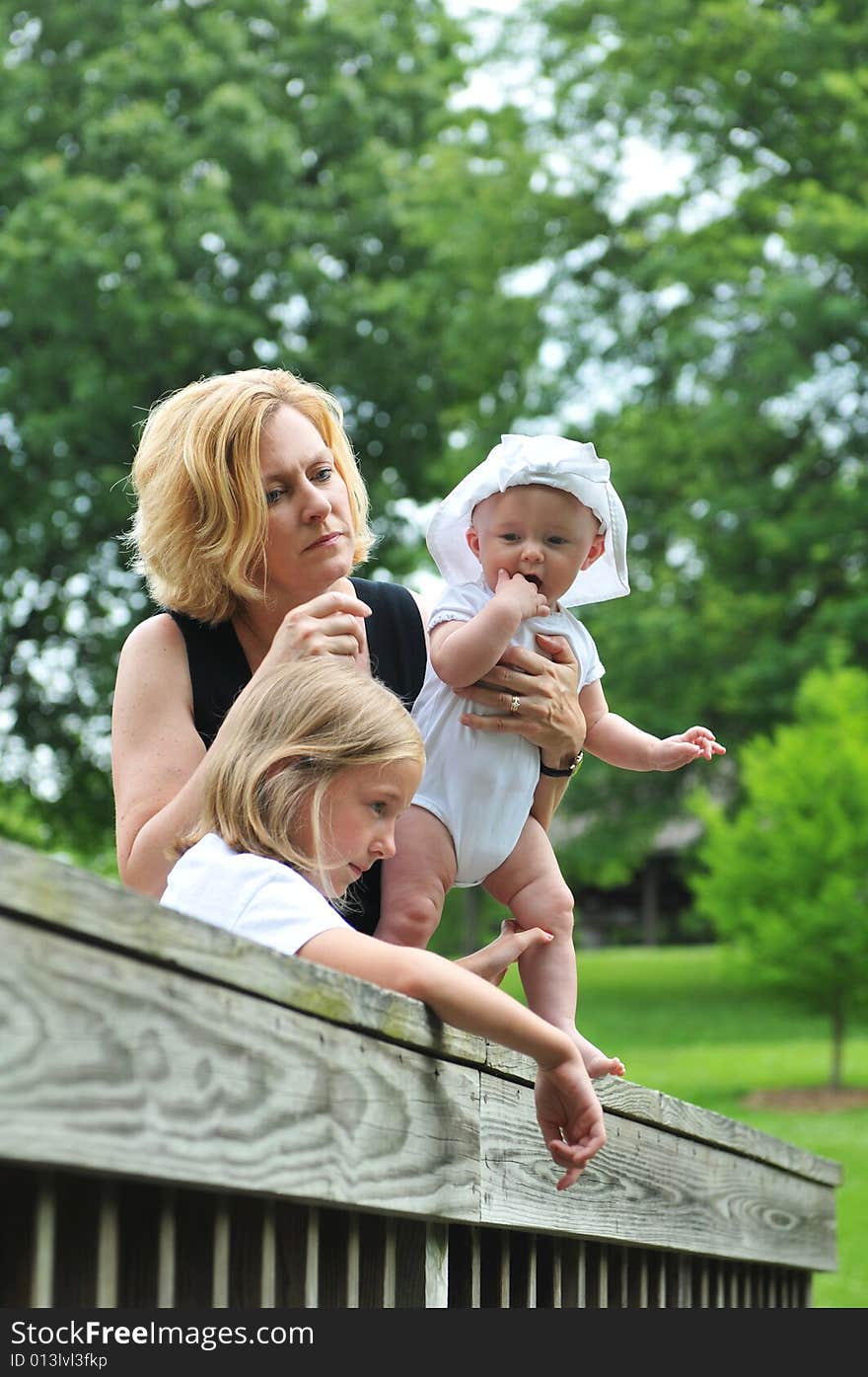 Mother and children outdoors