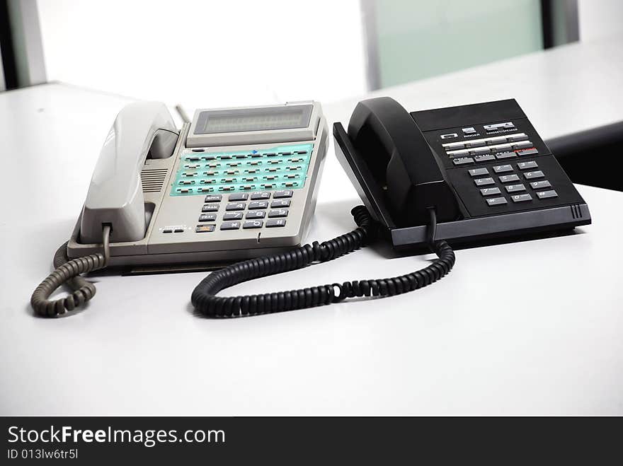 Black telephone image on the office table