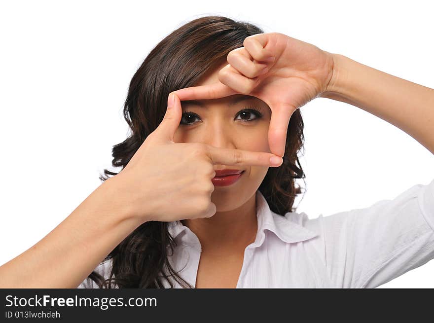 A Pretty Young Asian Woman With Framing Hands