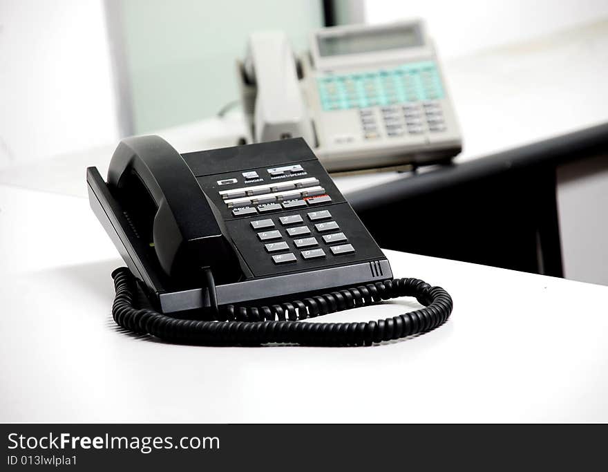 Focus a telephone on the office table