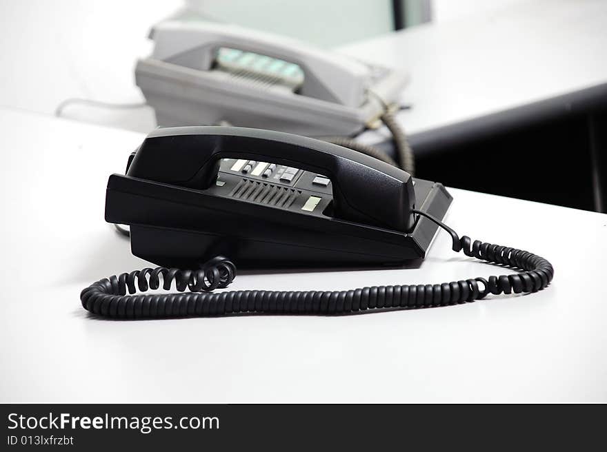 Black telephone image on the office table