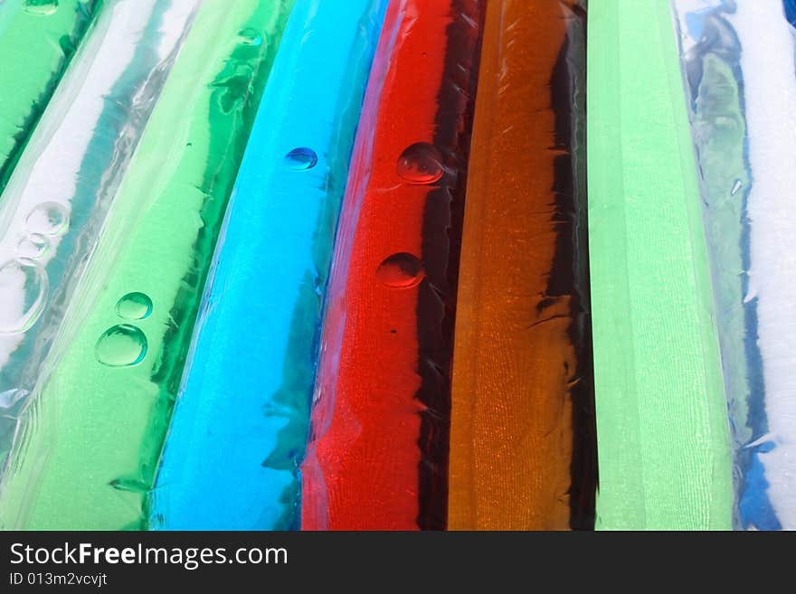 Blue, red, brown and green liquid background. Blue, red, brown and green liquid background