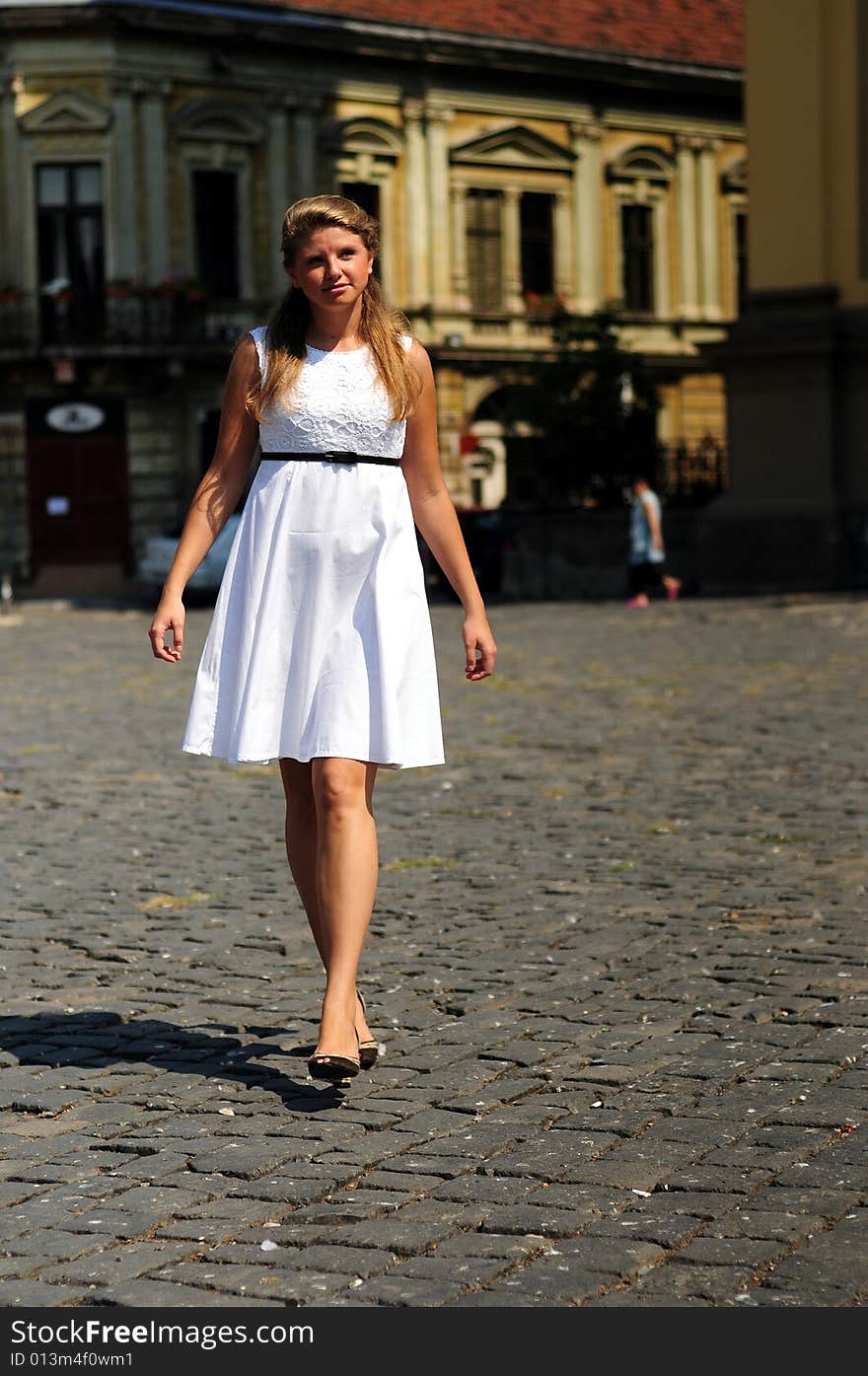 Portrait of a young attractive girl in the city. Portrait of a young attractive girl in the city