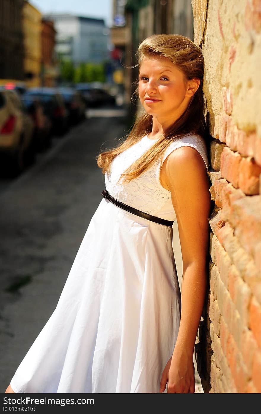 Portrait of a young attractive girl in the city. Portrait of a young attractive girl in the city