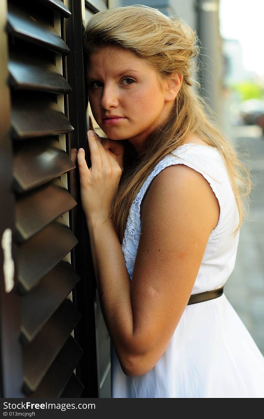 Portrait of a young attractive girl in the city. Portrait of a young attractive girl in the city