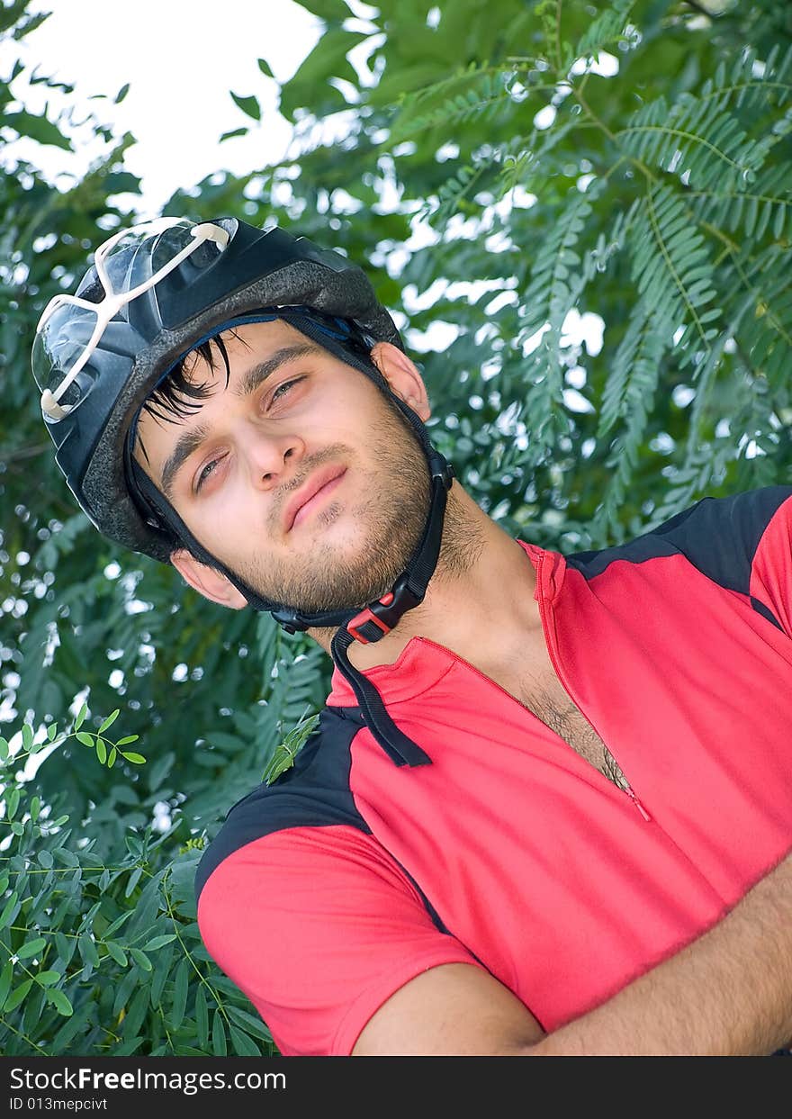 Portrait of cyclist in the protective helmet