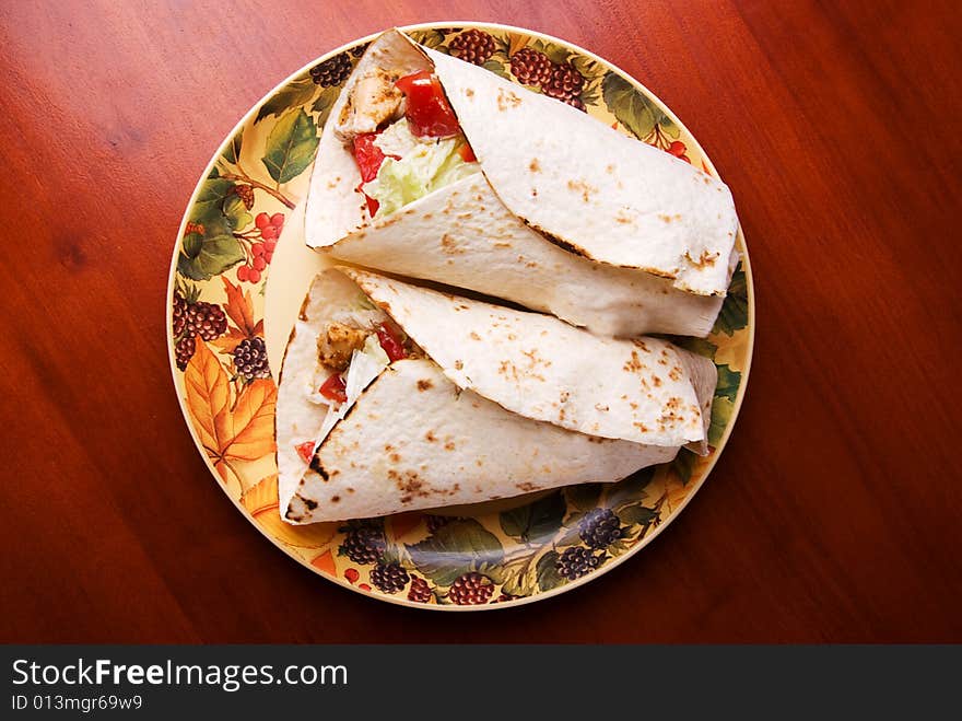 Tortilla; traditional mexican food; fast-food with chicken. Tortilla; traditional mexican food; fast-food with chicken