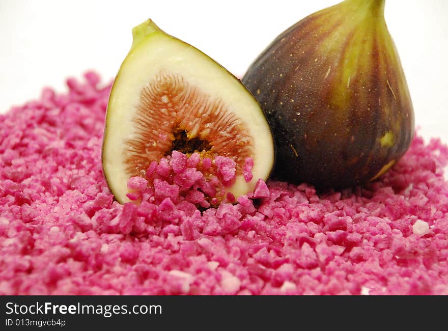 Figs on a bed of pink sugar candy. Figs on a bed of pink sugar candy