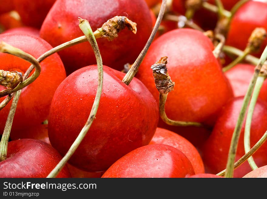 Fresh appetizing sweet cherry on a white background. Fresh appetizing sweet cherry on a white background