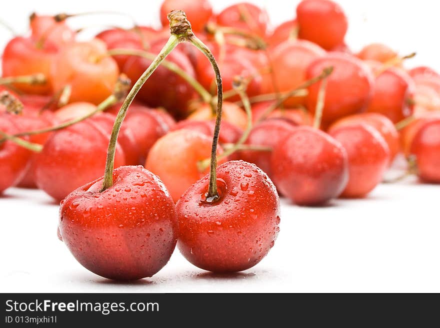 Fresh appetizing sweet cherry on a white background. Fresh appetizing sweet cherry on a white background