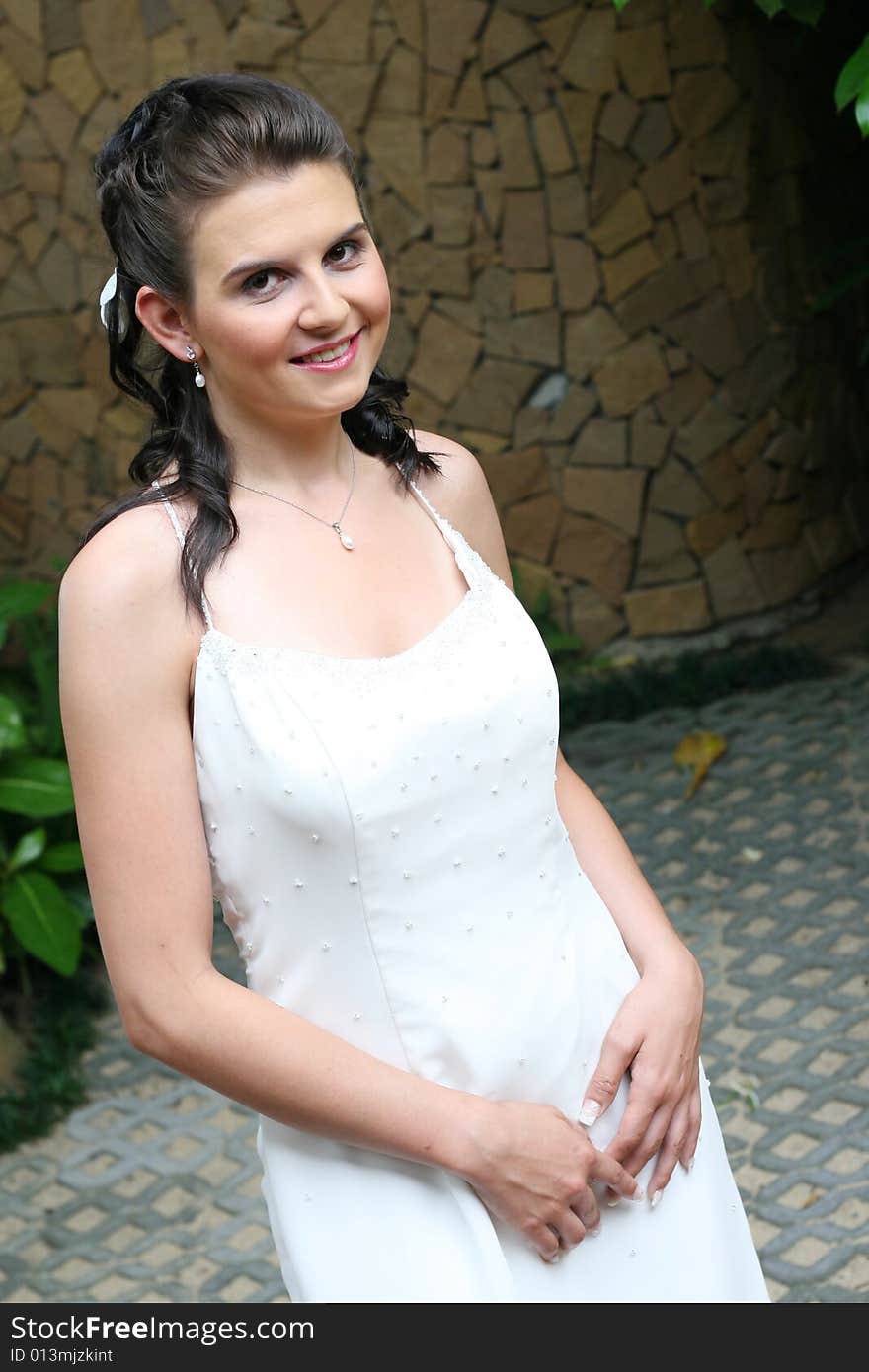 Beautiful young bride with flowers in her hair.