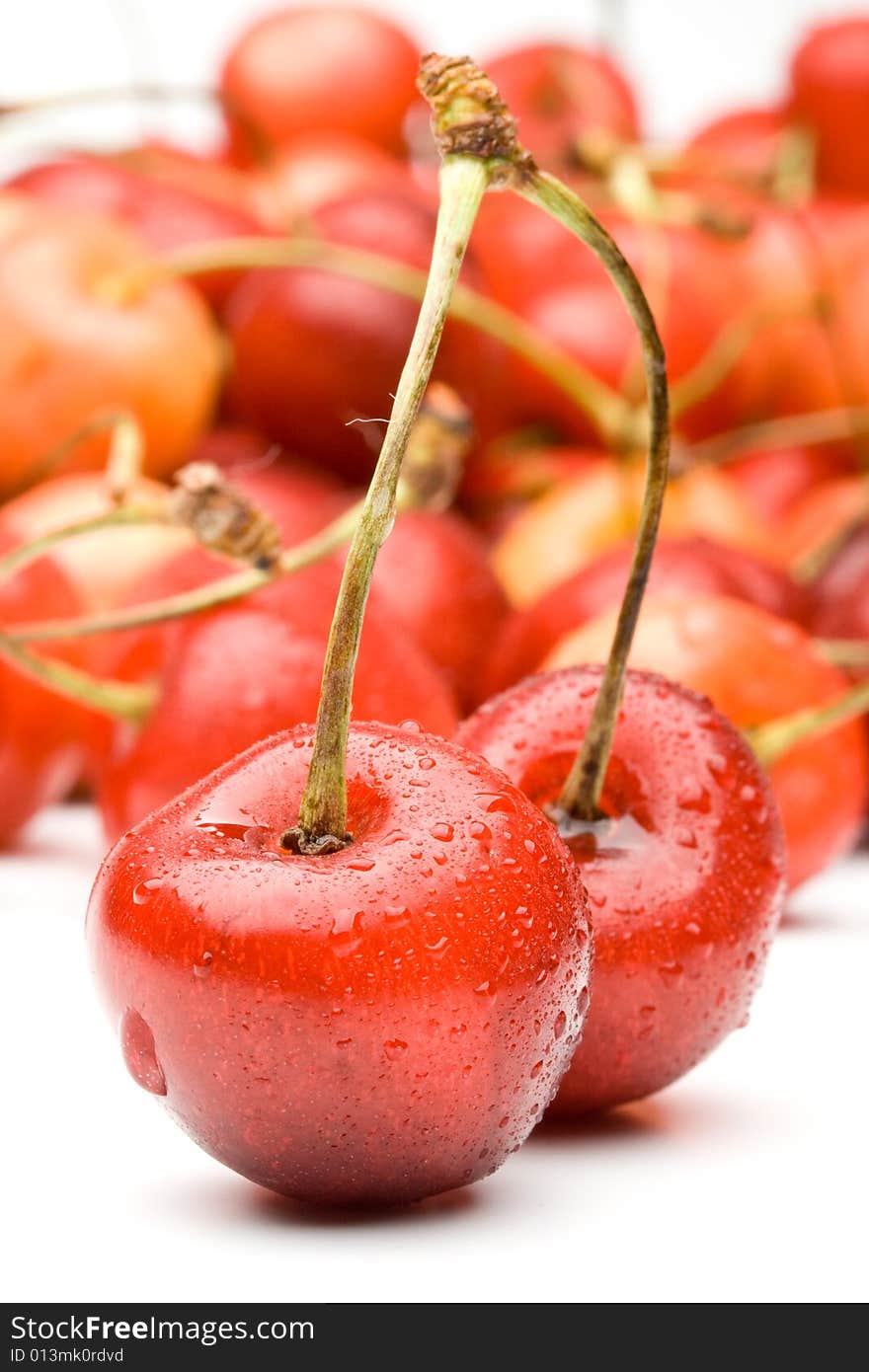 Fresh appetizing sweet cherry on a white background. Fresh appetizing sweet cherry on a white background