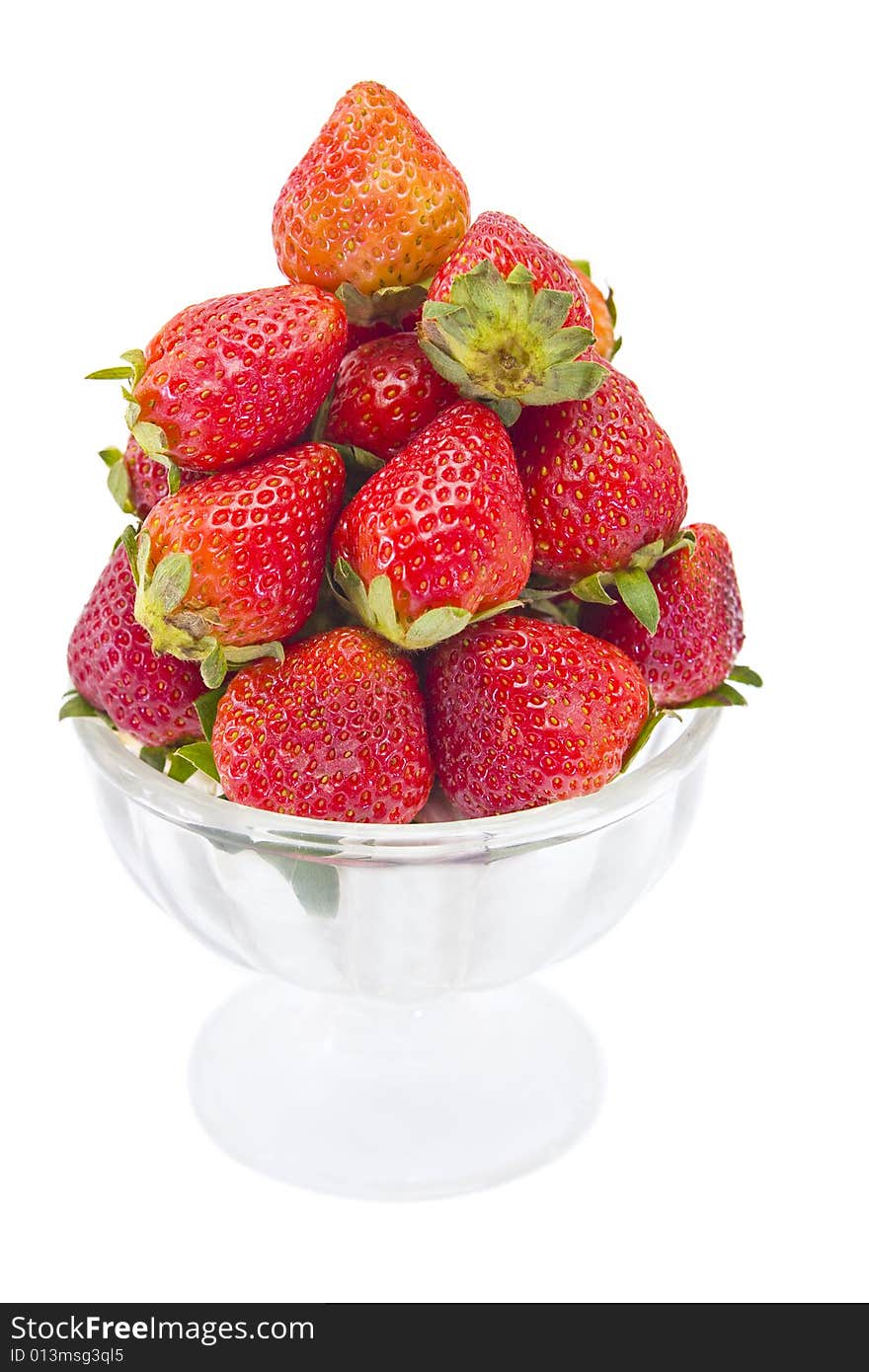 Bowl of ripe strawberries on a white background