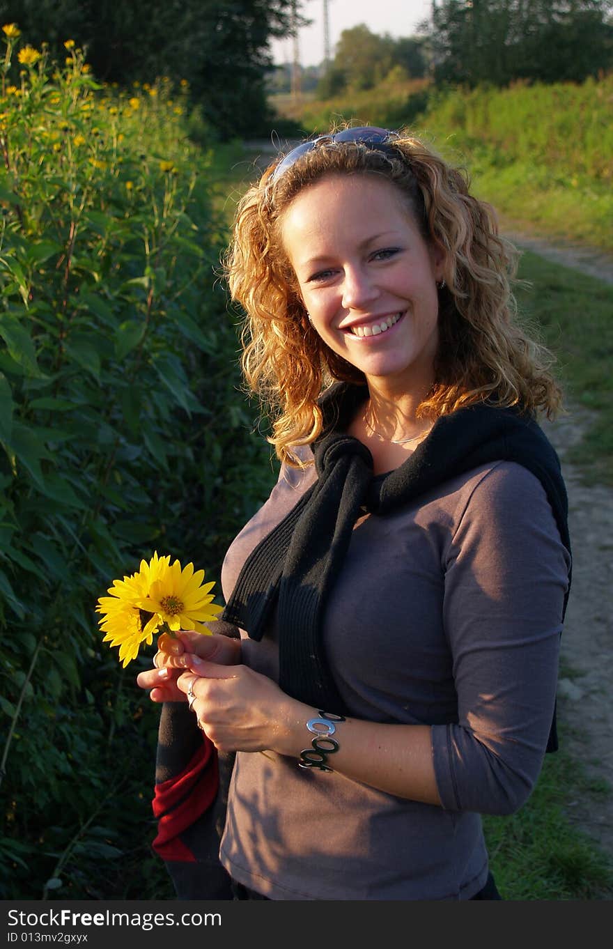 Curly girl with flowers