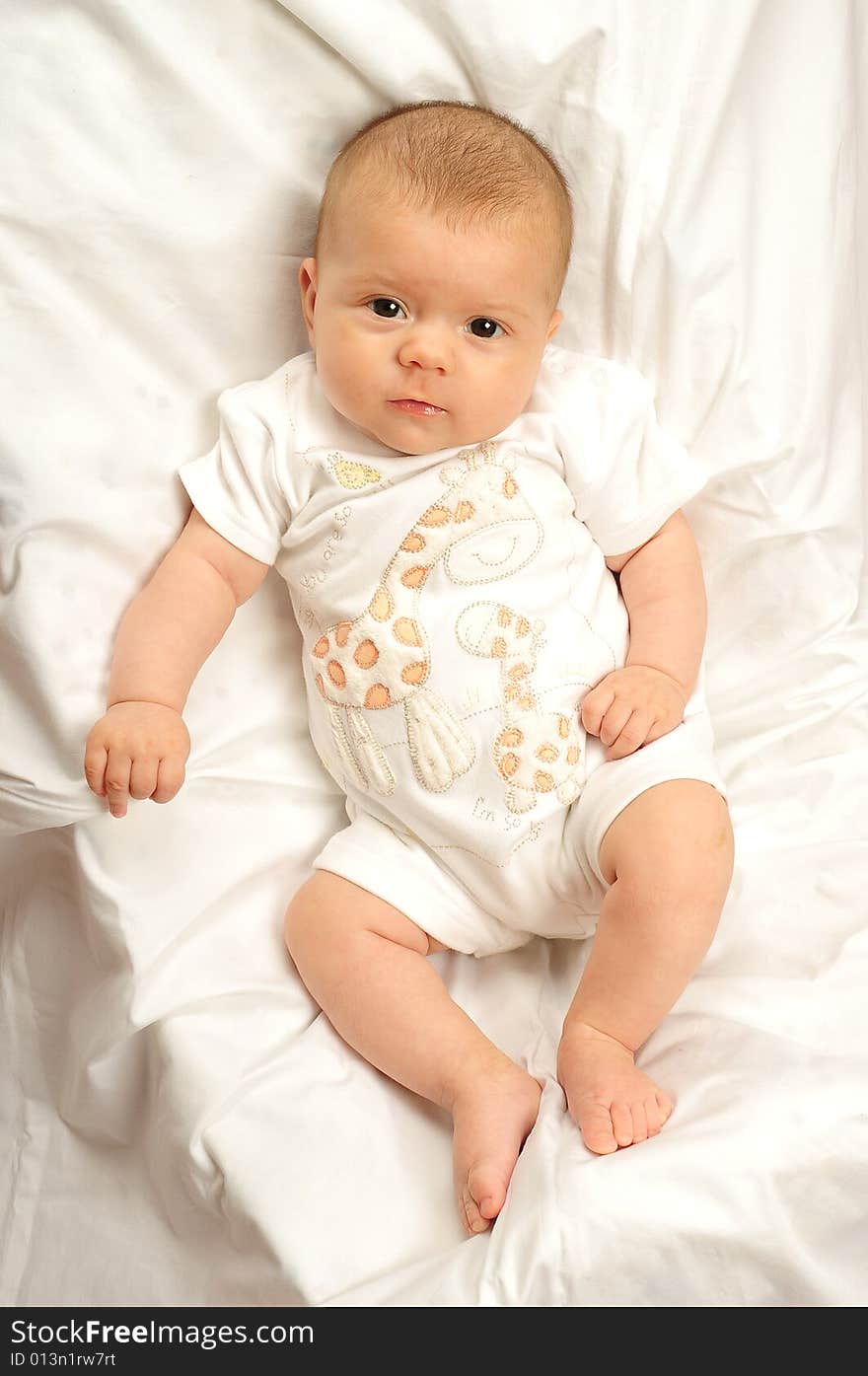 A little cute baby portrait over white. A little cute baby portrait over white