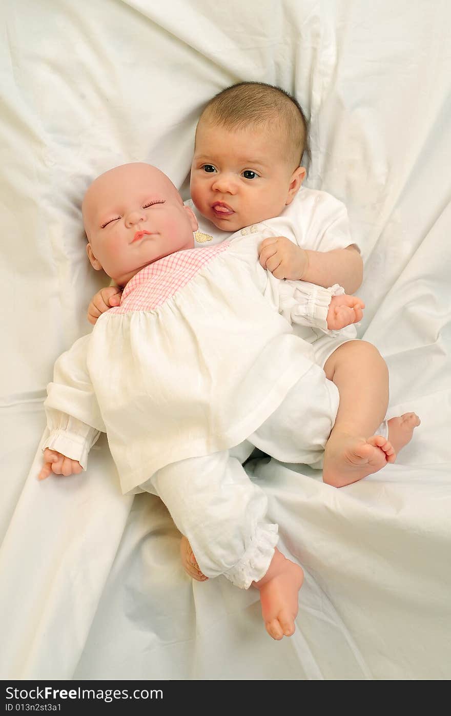 A little cute baby portrait over white. A little cute baby portrait over white