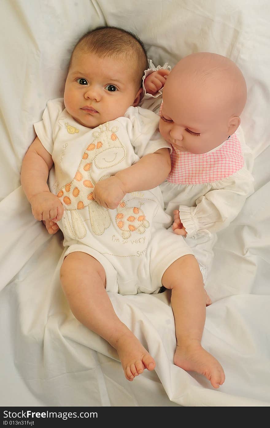 A little cute baby portrait over white. A little cute baby portrait over white