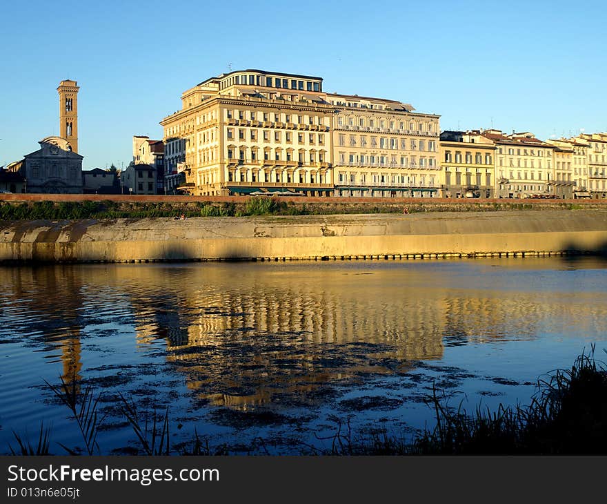 A wonderful shot of buildings and church reflected in the ARno river in Florence. A wonderful shot of buildings and church reflected in the ARno river in Florence