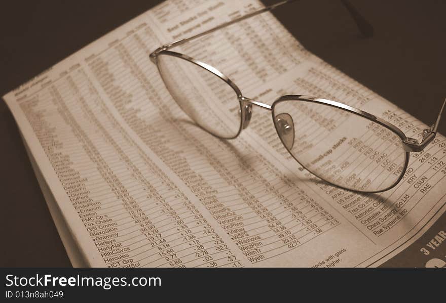 Glasses and Paper in Sepia