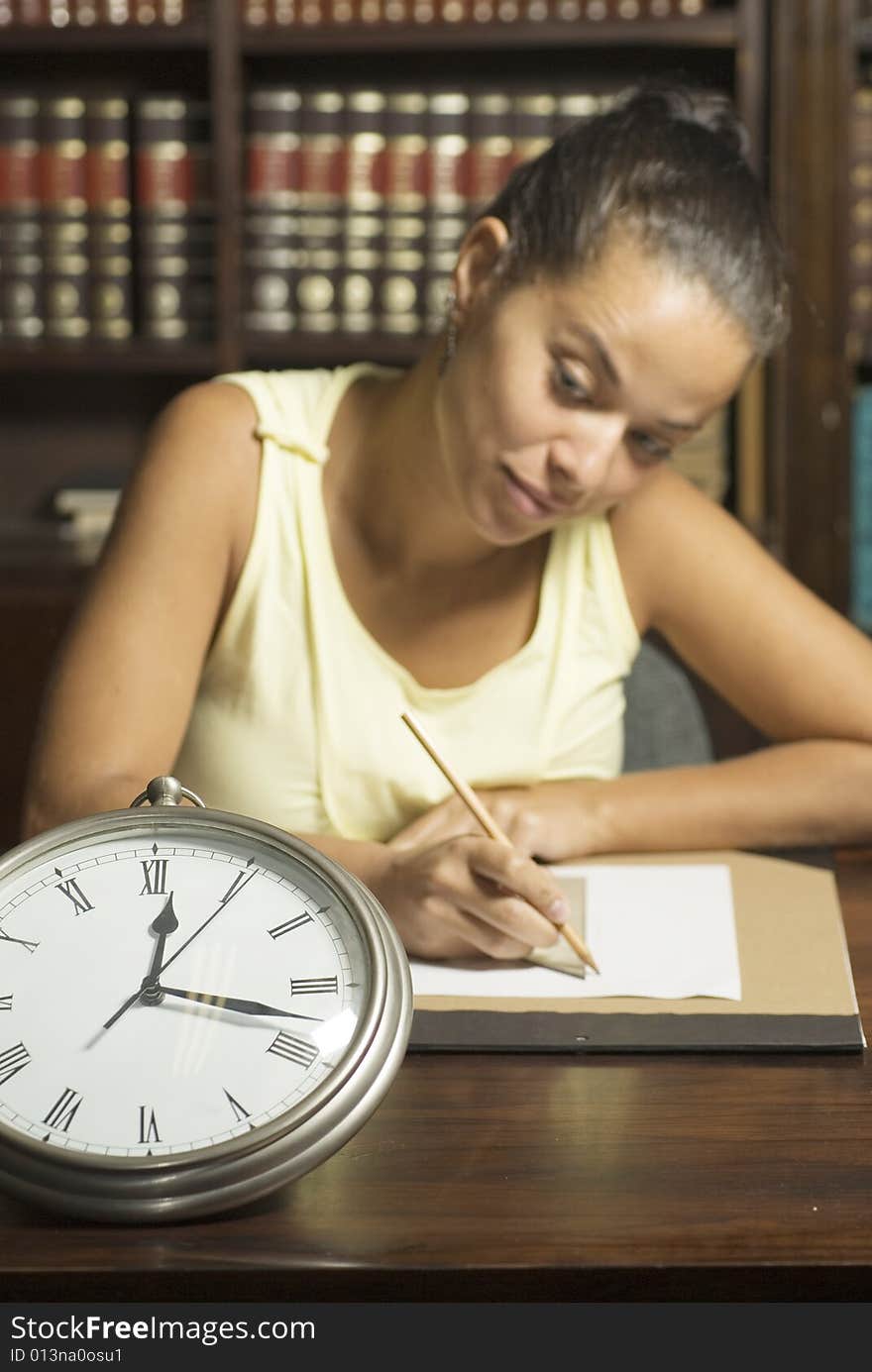 Woman Seated By Clock - Horizontal