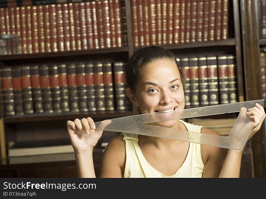 Woman Biting on a Protractor - Horizontal