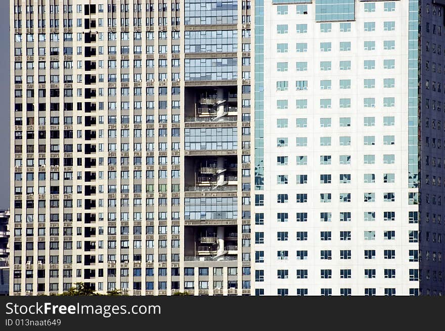 China, Shanghai - closeup photo of modern buildings with visable windows and balconies. China, Shanghai - closeup photo of modern buildings with visable windows and balconies.