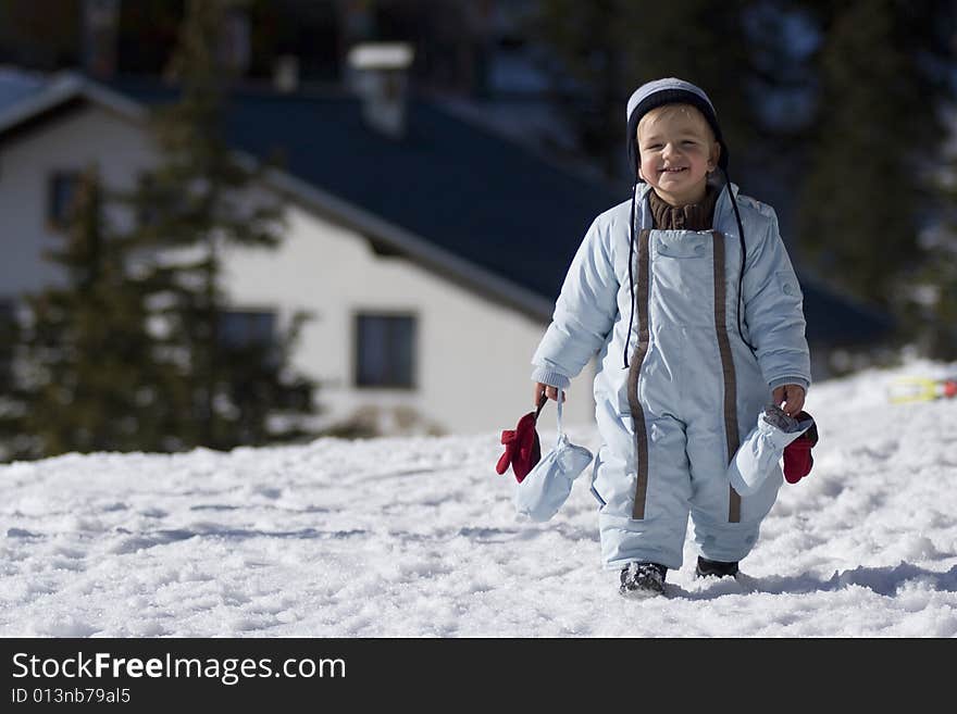 Happy Boy On The Snow