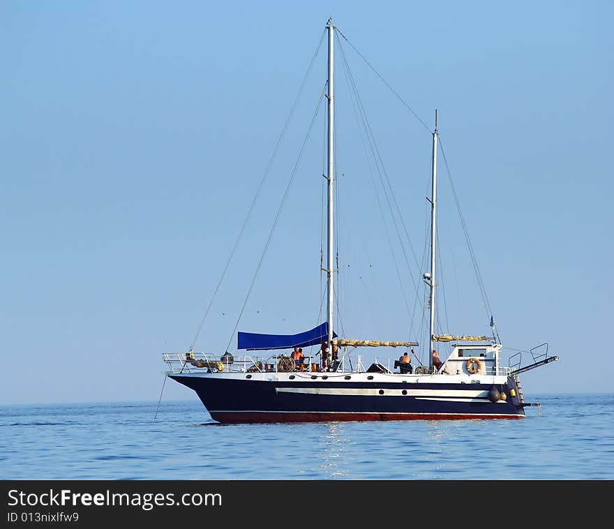 Sailboat sailing in the morning. Sailboat sailing in the morning