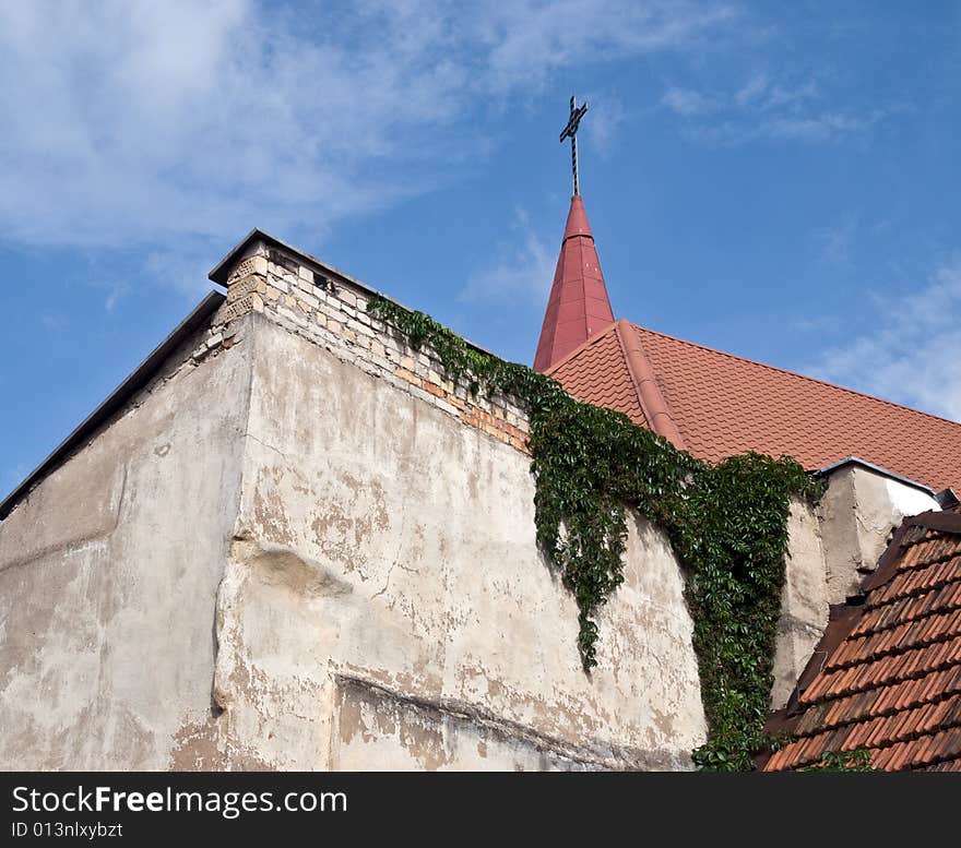 Spike of ancient church in an old city