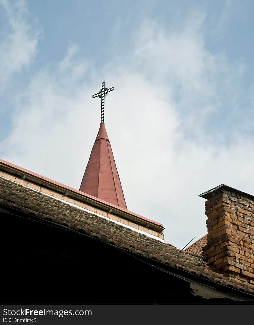 Spike of ancient church in an old city