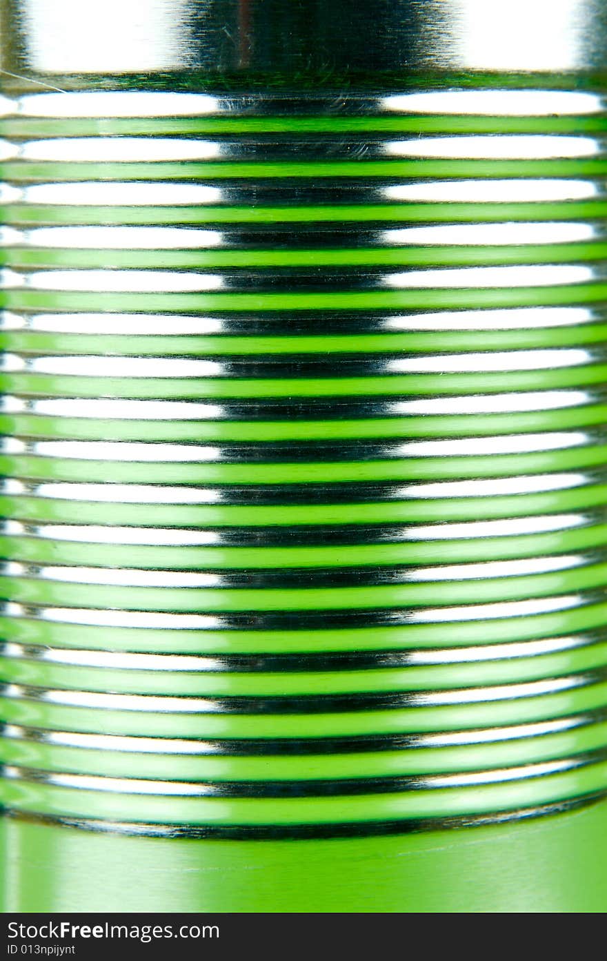 Assorted tins isolated against a green background. Assorted tins isolated against a green background