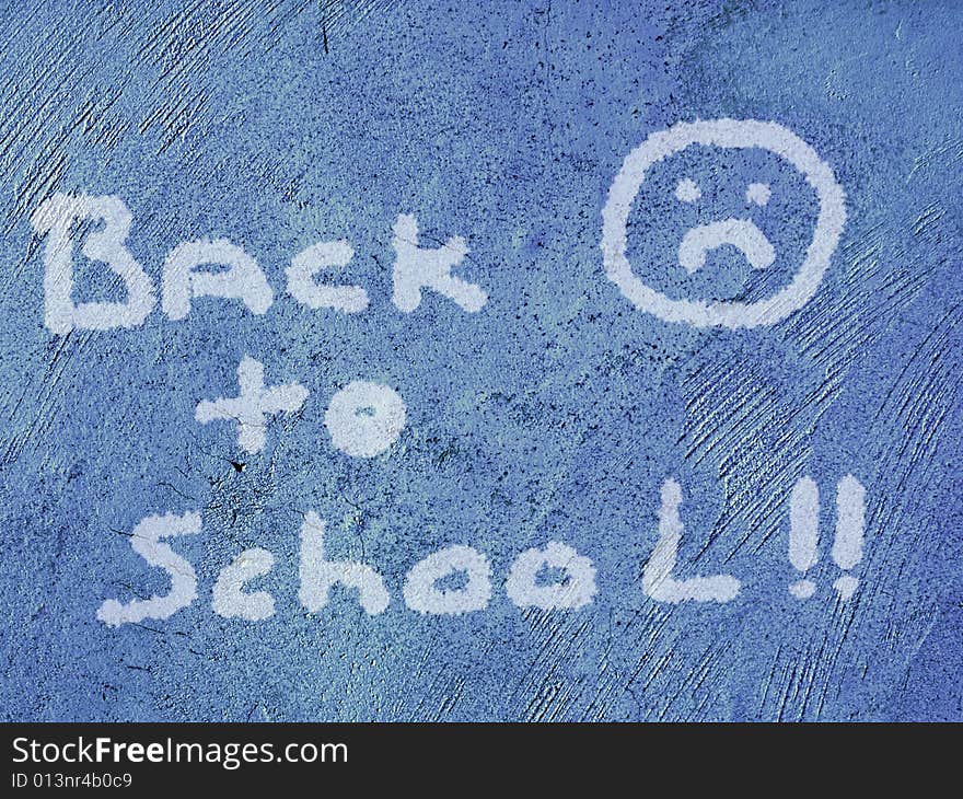 Back to school sign on a blue grunge background