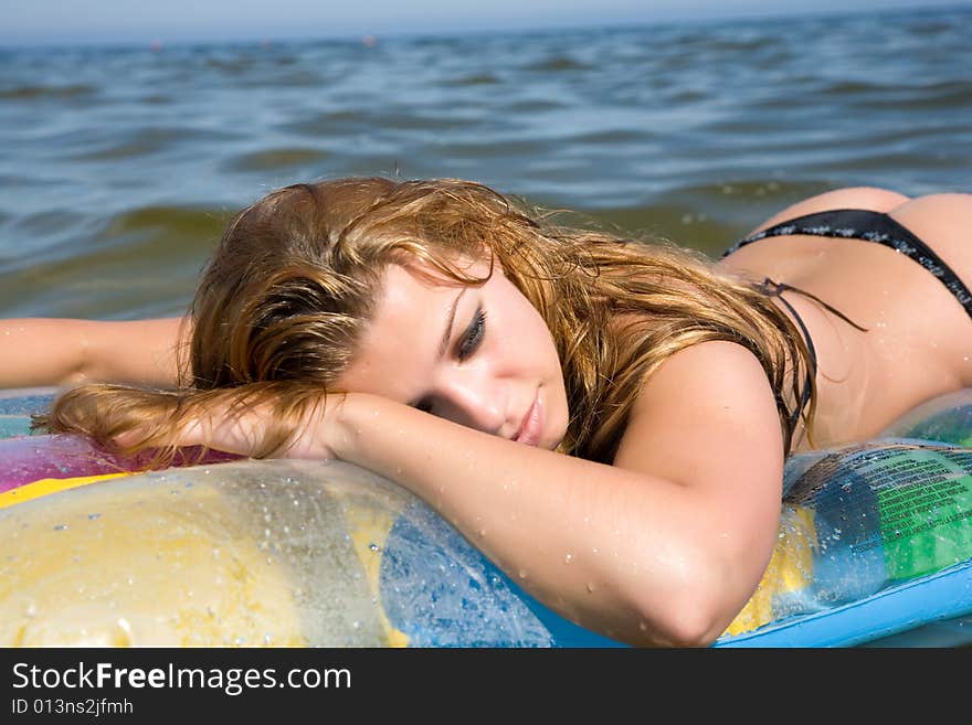 Beautiful Girl Swiming On Air-mattress