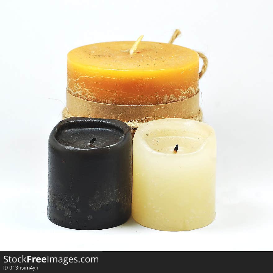 3 candles on a white background