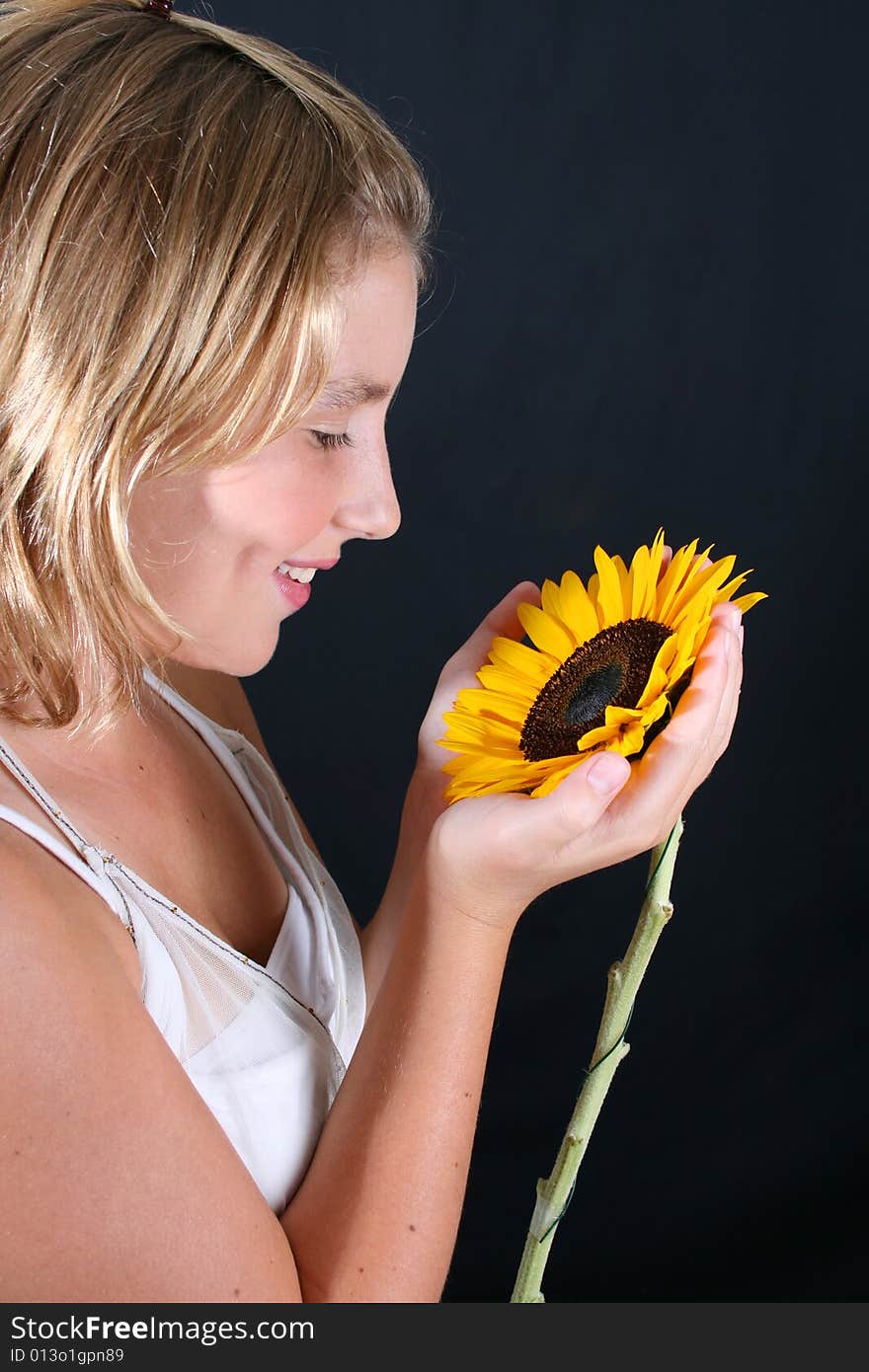 Teenage female model on a black background. Teenage female model on a black background