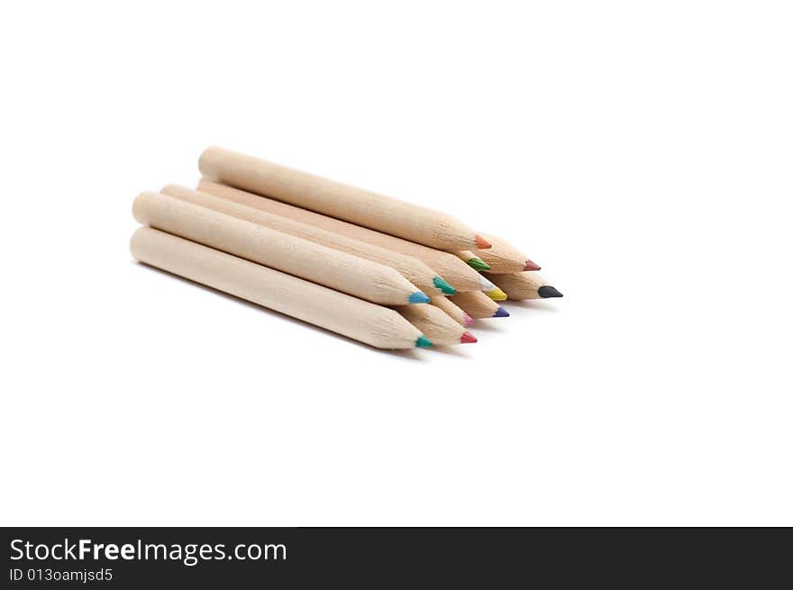 Colored pencils on a white background