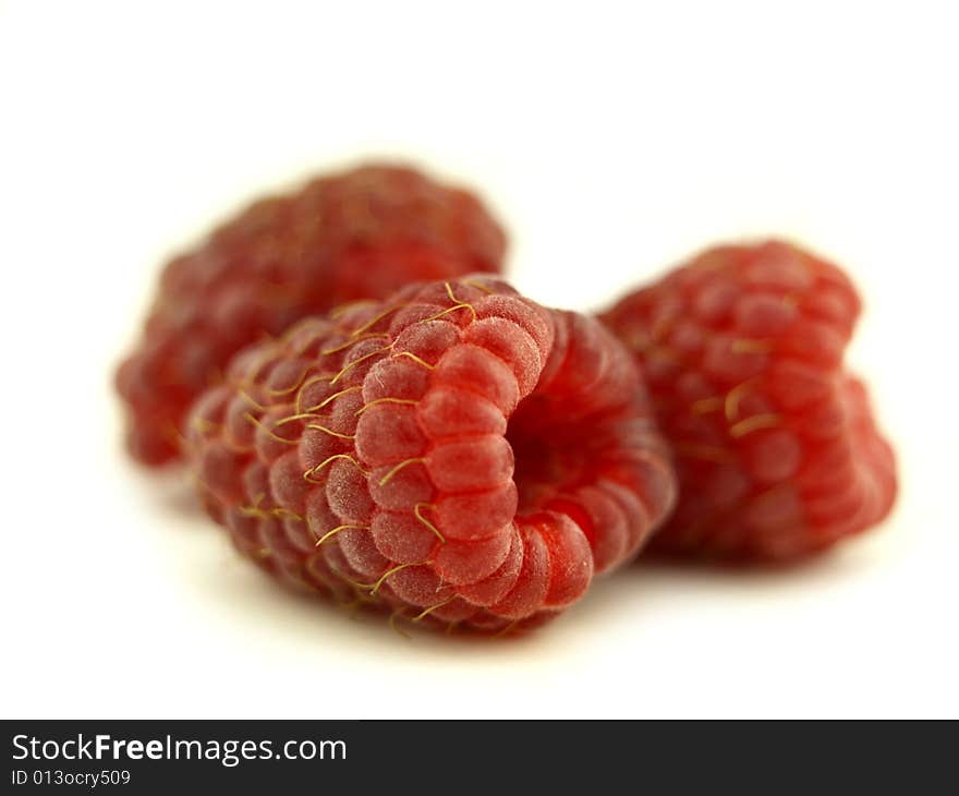 Raspberry in zoom and red fruit