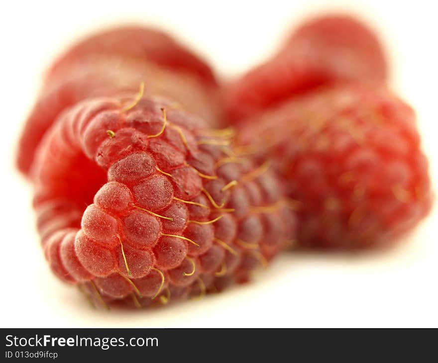 Raspberry in zoom and red fruit