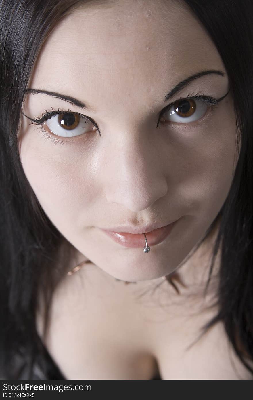 Portrait of a young woman with long black hair. Portrait of a young woman with long black hair