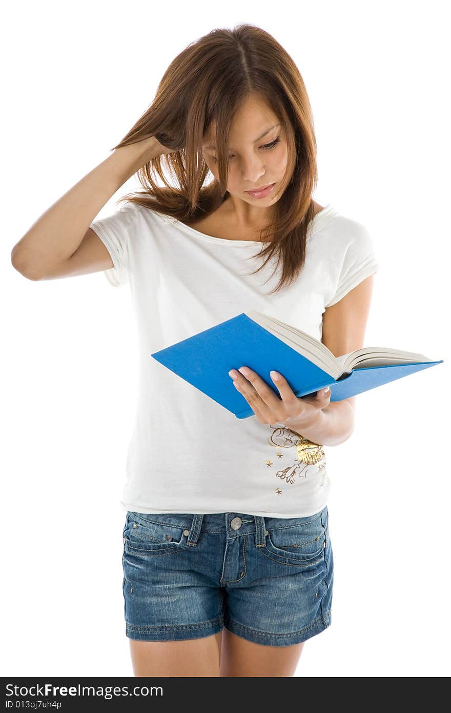 Young  girl with book  on the white. Young  girl with book  on the white