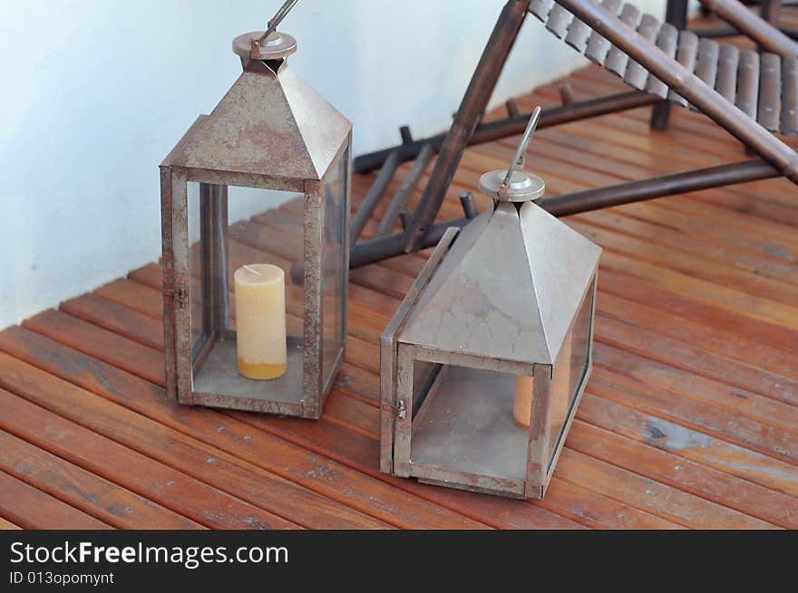 Tin lamps with a candle in it