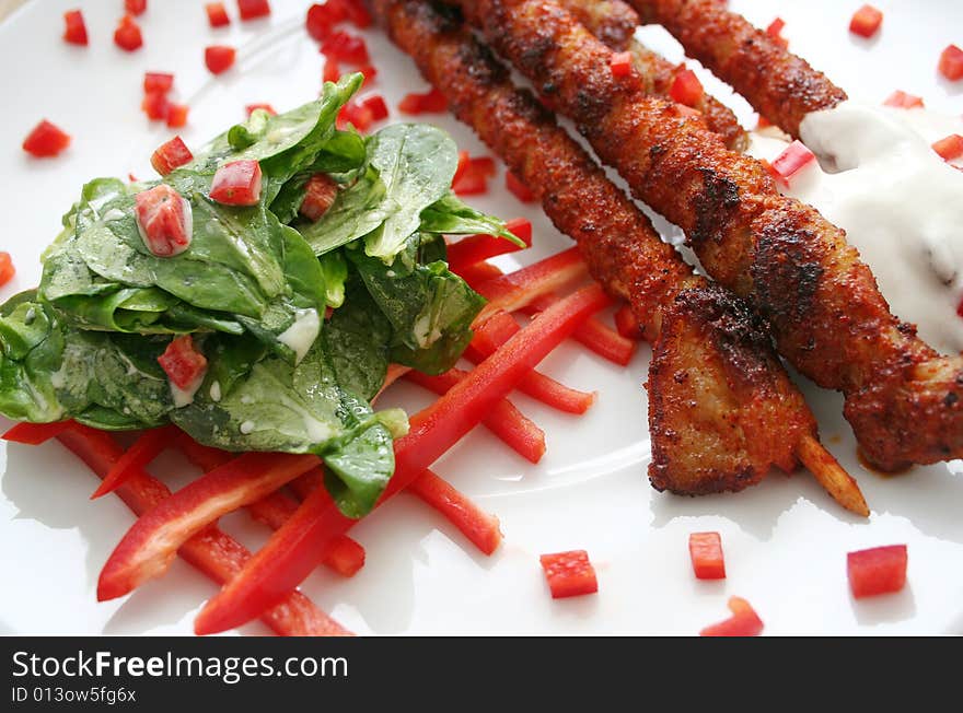 Some pork meat with fresh field Salad. Some pork meat with fresh field Salad