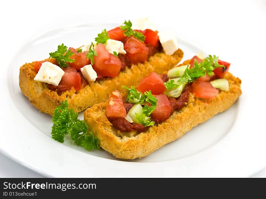 Bruschetta with tomato,cheese and other stuffing.