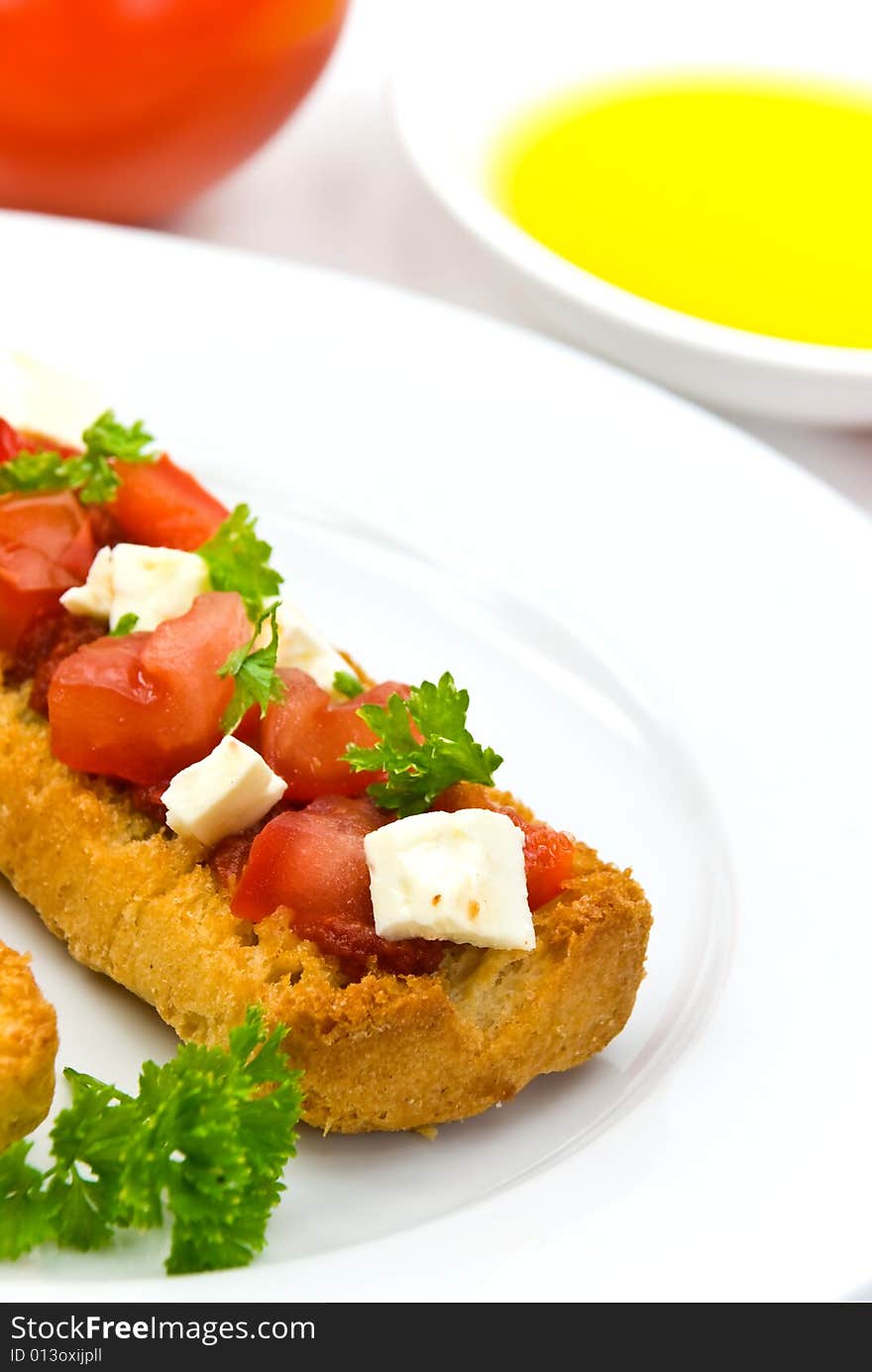 Bruschetta with tomato,cheese and other stuffing.