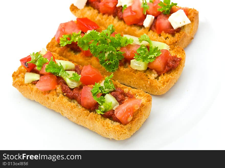 Bruschetta with tomato,cheese and other stuffing.