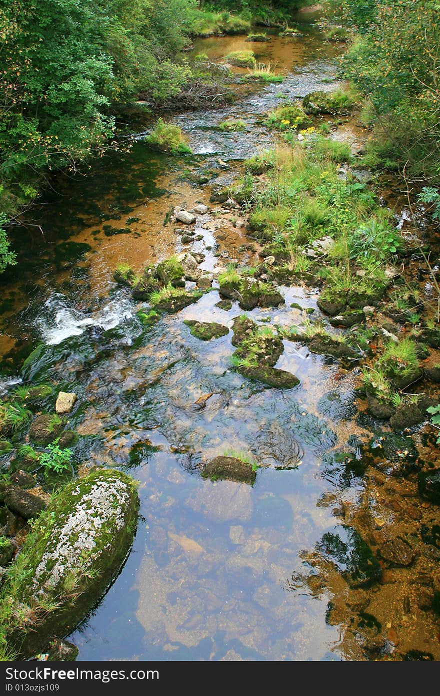 A little stream in the mountain valley. A little stream in the mountain valley