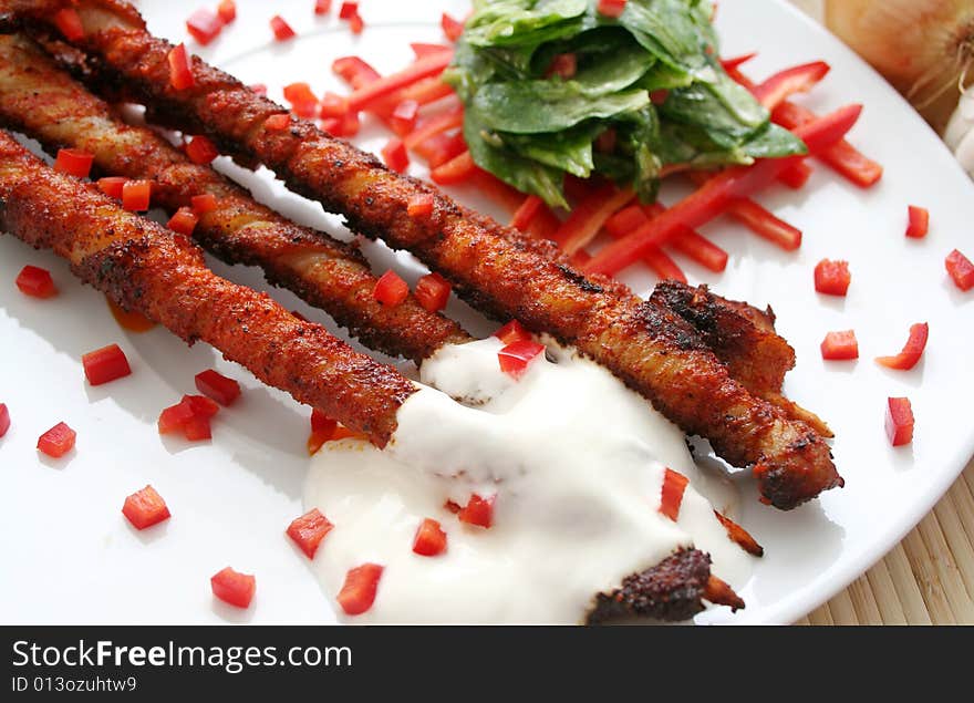 Some pork meat with fresh field Salad. Some pork meat with fresh field Salad