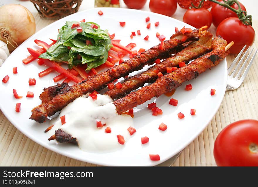 Some pork meat with fresh field Salad. Some pork meat with fresh field Salad