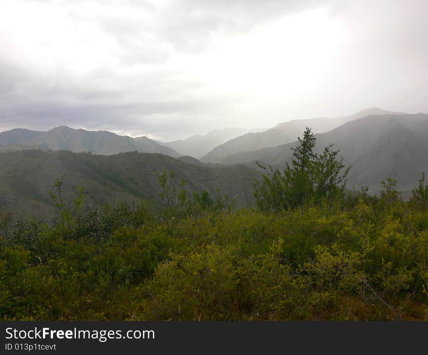 Illuminated tops of the mountains