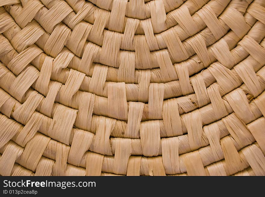 Detail of a container made of straw, with medium contrast. Detail of a container made of straw, with medium contrast